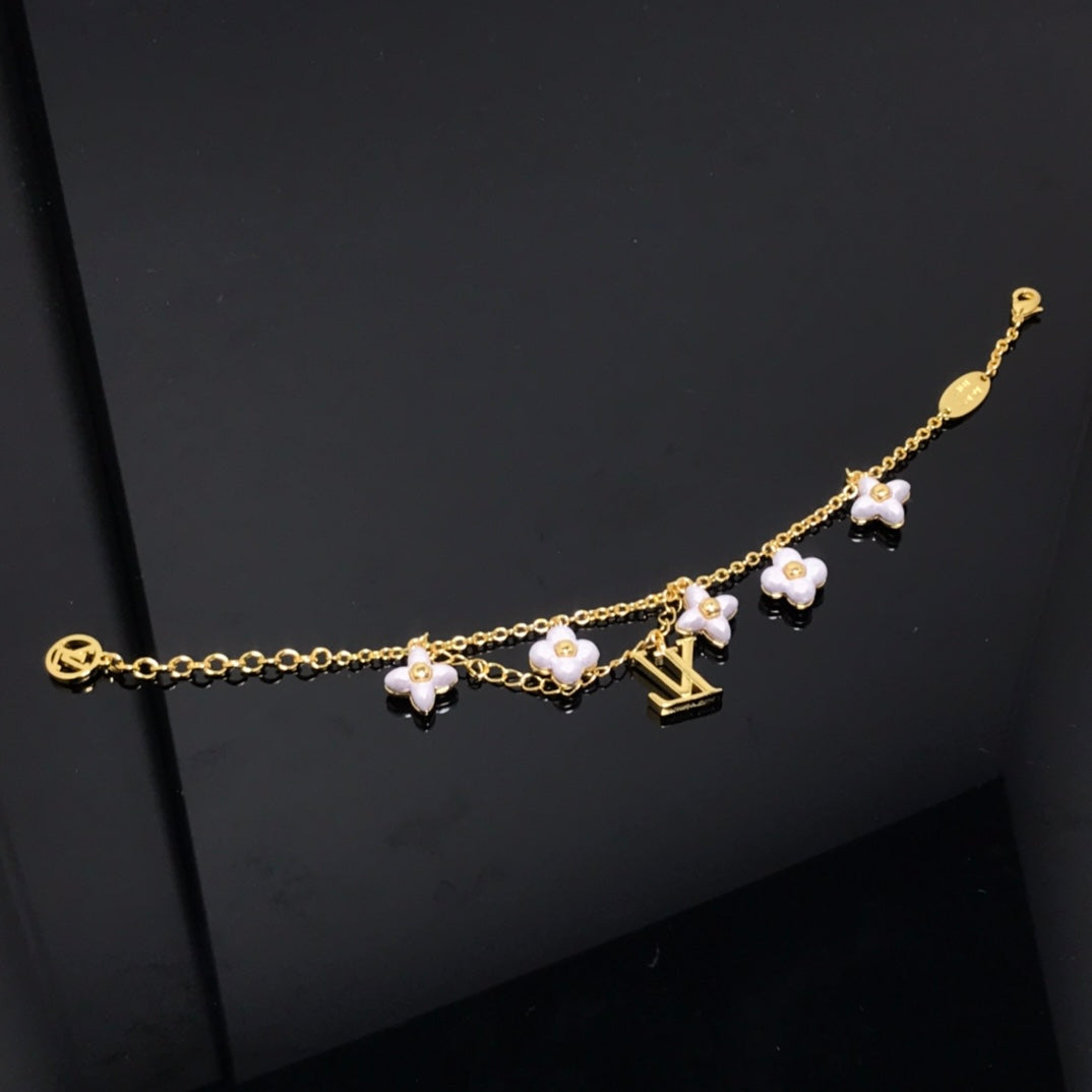 [Violet JW]LOGO 6 MOTIF STAR AND SUN GOLD BRACELET